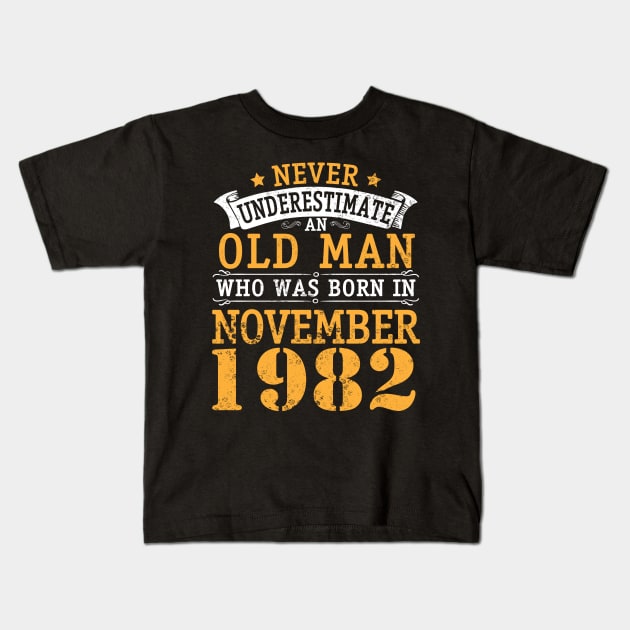 Happy Birthday 38 Years Old To Me You Never Underestimate An Old Man Who Was Born In November 1982 Kids T-Shirt by bakhanh123